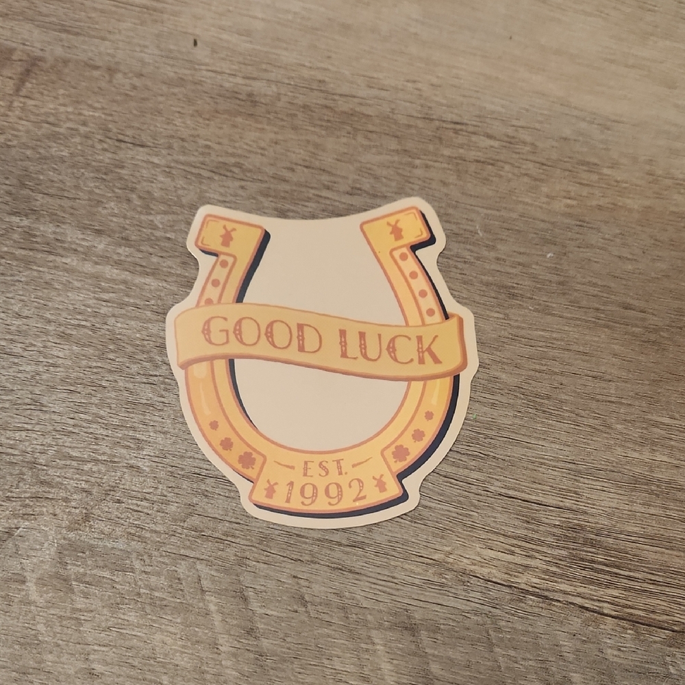 Dutch Bros Good Luck Horseshoe Sticker - Yellow, Cream, Black